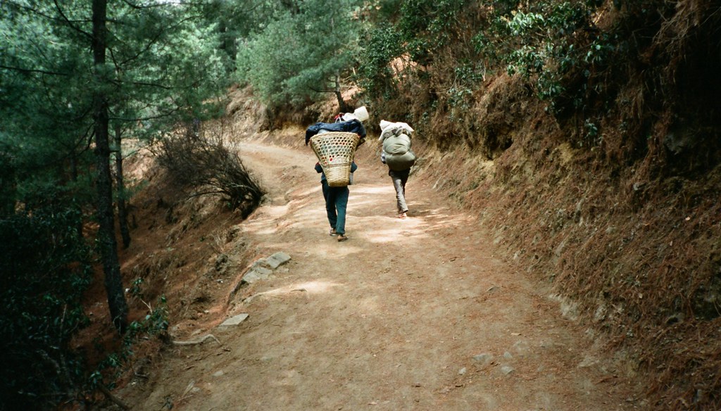 Porters carrying loads in Namche Bazar trail